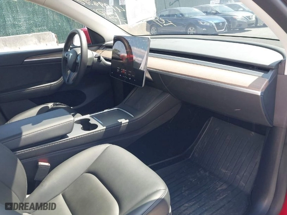 2023 Tesla Model Y Long Range with VIN 7SAYGDEE0PA094810, listed as a IAAI auction lot 41998312 with 10,376 mi miles. Bid and sale history available at carsss.com. Image 5.