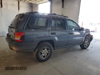 2004 Jeep Grand Cherokee Laredo z VIN 1J4GW48S14C338788, wystawiony jako Copart lot #53136715 z przebiegiem 150 352 mil mil oraz Szkoda całkowita • Salvage title. Historia ofert i sprzedaży dostępna na DreamBid. Obrazek 3.