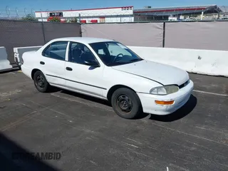 1997 Geo Prizm LSi z VIN 1Y1SK5269VZ446843, wystawiony jako IAAI lot #42521888 z przebiegiem 72 451 mil mil oraz . Historia ofert i sprzedaży dostępna na DreamBid. Obrazek 1.