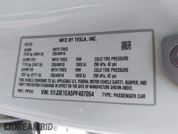 2023 Tesla Model 3 with VIN 5YJ3E1EA5PF407054, listed as a IAAI auction lot 42313770 with 57,621 mi miles and . Bid and sale history available at DreamBid. Image 9.