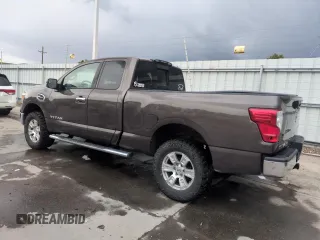 2017 Nissan Titan S z VIN 1N6AA1CJ2HN553031, wystawiony jako Copart lot #59764065 z przebiegiem 148 012 mil mil oraz Szkoda całkowita • Salvage title. Historia ofert i sprzedaży dostępna na DreamBid. Obrazek 2.