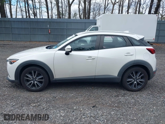 2018 Mazda CX-3 Touring with VIN JM1DKFC71J0315074, listed as a IAAI auction lot 42029790 with 100,268 mi miles. Bid and sale history available at carsss.com. Image 14.