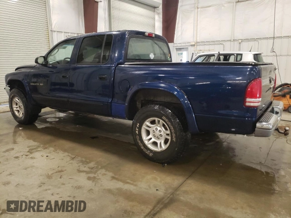 2002 Dodge Dakota SLT with VIN 1B7HG48N12S653207, listed as a Copart auction lot 86149264 with 215,021 mi miles and Salvage Title. Bid and sale history available at carsss.com. Image 2.