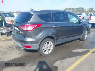 2015 Ford Escape Titanium with VIN 1FMCU0JX1FUB92412, listed as a IAAI auction lot 41893933 with 95,306 mi miles. Bid and sale history available at carsss.com. Image 4.
