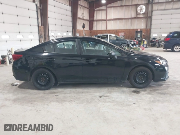2021 Subaru Impreza with VIN 4S3GKAB64M3601075, listed as a IAAI auction lot 42530164 with 90,522 mi miles and . Bid and sale history available at DreamBid. Image 14.