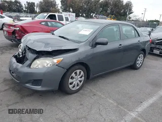 2009 Toyota Corolla with VIN JTDBL40E899066243, listed as a IAAI auction lot 41884292 with 219,338 mi miles. Bid and sale history available at carsss.com. Image 2.