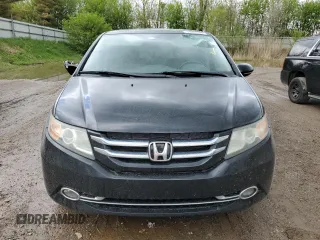 2014 Honda Odyssey Touring z VIN 5FNRL5H97EB508649, wystawiony jako Copart lot #55665245 z przebiegiem 162 892 mil mil oraz Czysty tytuł • Clean title. Historia ofert i sprzedaży dostępna na DreamBid. Obrazek 5.