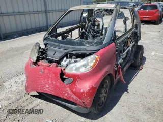 2009 Smart fortwo Passion z VIN WMEEK31X99K211682, wystawiony jako Copart lot #54110385 z przebiegiem Nie podano mil oraz Szkoda całkowita • Salvage title. Historia ofert i sprzedaży dostępna na DreamBid. Obrazek 1.