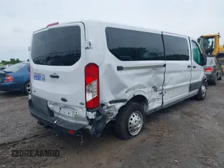 2023 Ford Transit Passenger XL with VIN 1FBAX9Y83PKC08567, listed as a IAAI auction lot 39883261 with 15,028 mi miles and . Bid and sale history available at DreamBid. Image 4.