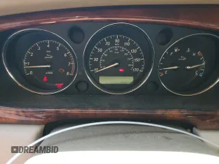 2004 Jaguar XJ with VIN SAJWA71C34SG16508, listed as a Copart auction lot 66751644 with 179,039 mi miles and Salvage Title. Bid and sale history available at carsss.com. Image 9.