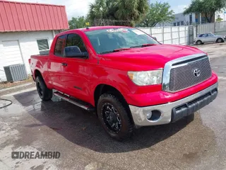 2012 Toyota Tundra z VIN 5TFRM5F16CX045125, wystawiony jako IAAI lot #41948641 z przebiegiem 147 568 mil mil oraz . Historia ofert i sprzedaży dostępna na DreamBid. Obrazek 1.