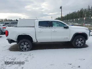 2023 GMC Canyon 4WD AT4 with VIN 1GTP6DEK4P1263112, listed as a IAAI auction lot 41445424 with 27,260 mi miles. Bid and sale history available at carsss.com. Image 13.