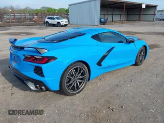 2023 Chevrolet Corvette 2LT z VIN 1G1YB2D41P5135323, wystawiony jako IAAI lot #41914578 z przebiegiem 4 957 mil mil oraz . Historia ofert i sprzedaży dostępna na DreamBid. Obrazek 4.