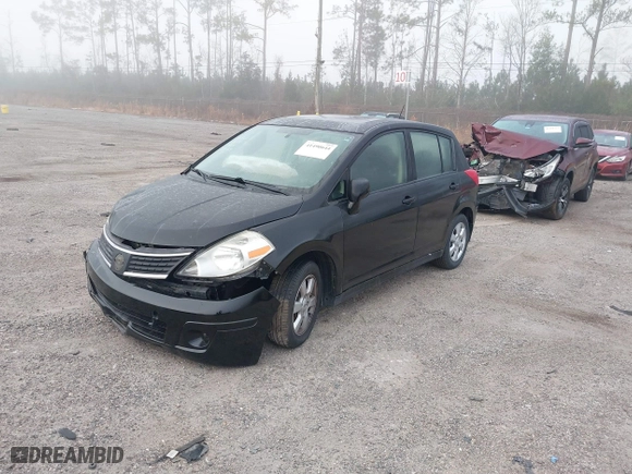 2009 Nissan Versa 1.8 S with VIN 3N1BC13E99L423269, listed as a IAAI auction lot 41490644 with 124,241 mi miles. Bid and sale history available at carsss.com. Image 2.