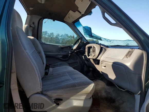 1998 Ford F-150 with VIN 1FTZF18W1WNA35212, listed as a Copart auction lot 45361785 with 227,735 mi miles and Salvage title. Bid and sale history available at DreamBid. Image 7.