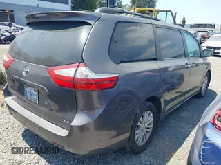 2015 Toyota Sienna XLE with VIN 5TDYK3DC2FS686969, listed as a IAAI auction lot 42559541 with 103,190 mi miles and . Bid and sale history available at DreamBid. Image 4.