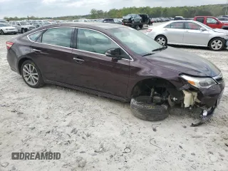 2015 Toyota Avalon Limited with VIN 4T1BK1EB8FU187245, listed as a Copart auction lot 51579295 with 200,726 mi miles and Salvage Title. Bid and sale history available at DreamBid. Image 4.