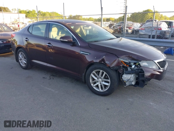 2013 Kia Optima LX with VIN 5XXGM4A71DG124725, listed as a IAAI auction lot 42041768 with 184,181 mi miles and . Bid and sale history available at carsss.com. Image 1.
