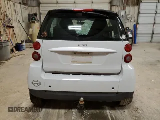 2010 Smart fortwo Pure z VIN WMEEJ3BA7AK418332, wystawiony jako Copart lot #54827925 z przebiegiem 39 972 mil mil oraz Szkoda całkowita • Salvage title. Historia ofert i sprzedaży dostępna na DreamBid. Obrazek 6.