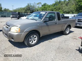 2004 Nissan Frontier XE z VIN 1N6DD26T54C472795, wystawiony jako Copart lot #57382115 z przebiegiem 200 903 mil mil oraz Szkoda całkowita • Salvage title. Historia ofert i sprzedaży dostępna na DreamBid. Obrazek 1.