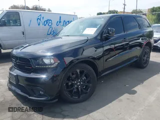 2019 Dodge Durango SXT Plus with VIN 1C4RDHAG8KC525198, listed as a IAAI auction lot 42022876 with 77,447 mi miles and . Bid and sale history available at DreamBid. Image 2.