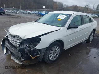 2010 Chrysler Sebring Touring with VIN 1C3CC4FB5AN192805, listed as a IAAI auction lot 41776044 with 143,968 mi miles and . Bid and sale history available at DreamBid. Image 2.