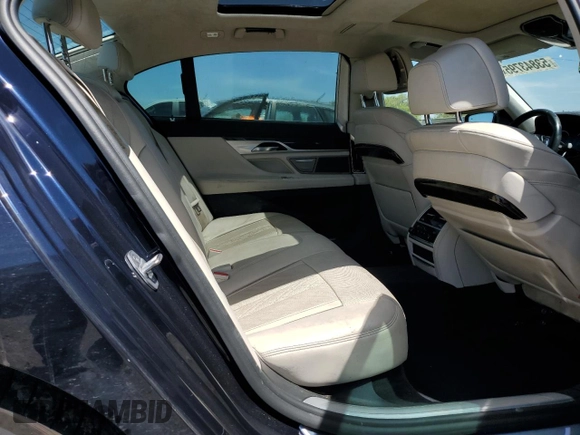 2018 BMW 7 Series 740i with VIN WBA7E2C58JG743126, listed as a Copart auction lot 53843795 with 90,614 mi miles and Salvage title. Bid and sale history available at DreamBid. Image 10.