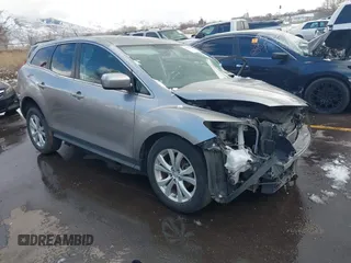 2010 Mazda CX-7 Touring with VIN JM3ER4WL1A0306704, listed as a IAAI auction lot 41805691 with 171,616 mi miles. Bid and sale history available at carsss.com. Image 1.