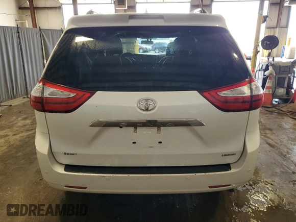 2015 Toyota Sienna XLE with VIN 5TDYK3DC4FS688299, listed as a Copart auction lot 61793155 with 57,197 mi miles and Salvage title. Bid and sale history available at DreamBid. Image 6.