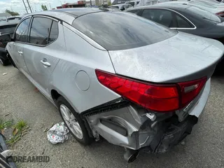 2014 Kia Optima EX with VIN 5XXGN4A70EG303904, listed as a Copart auction lot 51712855 with 1 mi miles and Clean Title. Bid and sale history available at carsss.com. Image 3.