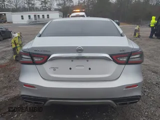 2019 Nissan Maxima Platinum z VIN 1N4AA6AV6KC372254, wystawiony jako IAAI lot #41519515 z przebiegiem 124 326 mil mil oraz . Historia ofert i sprzedaży dostępna na DreamBid. Obrazek 16.