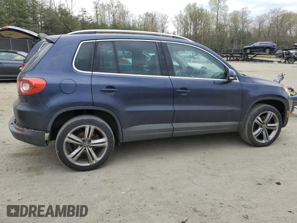 2011 Volkswagen Tiguan SE with VIN WVGBV7AX8BW523969, listed as a Copart auction lot 52463575 with 142,209 mi miles and Clean Title. Bid and sale history available at DreamBid. Image 3.