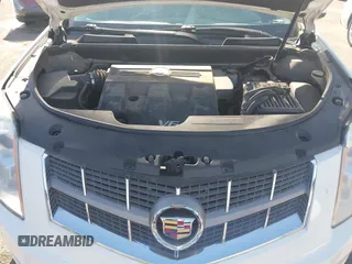 2012 Cadillac SRX Luxury Collection z VIN 3GYFNAE32CS518428, wystawiony jako IAAI lot #42153391 z przebiegiem 159 836 mil mil oraz . Historia ofert i sprzedaży dostępna na DreamBid. Obrazek 10.