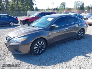 2017 Nissan Altima 2.5 SR with VIN 1N4AL3AP8HC180059, listed as a IAAI auction lot 42075133 with 197,955 mi miles. Bid and sale history available at carsss.com. Image 17.