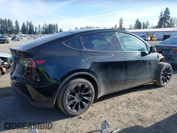 2021 Tesla Model Y Long Range with VIN 5YJYGDEE9MF301903, listed as a IAAI auction lot 42004007 with 26,740 mi miles. Bid and sale history available at carsss.com. Image 14.