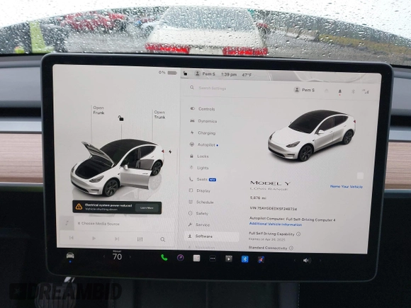 2025 Tesla Model Y Long Range with VIN 7SAYGDEDXSF248734, listed as a IAAI auction lot 41719195 with 5,876 mi miles and . Bid and sale history available at DreamBid. Image 18.