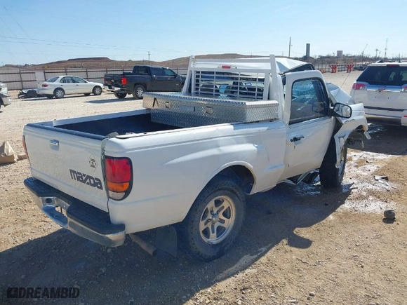 2000 Mazda B-Series 2WD Truck SX with VIN 4F4YR12C4YTM12672, listed as a IAAI auction lot 41679748 with NaN miles. Bid and sale history available at carsss.com. Image 4.