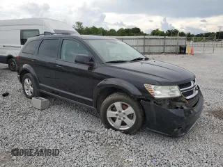 2012 Dodge Journey SXT с VIN 3C4PDCBG6CT387420, выставлен на аукционе Copart как лот 60035945 с пробегом 281 183 миль миль и Списание • Salvage title. История ставок и продаж доступна на DreamBid. Изображение 4.