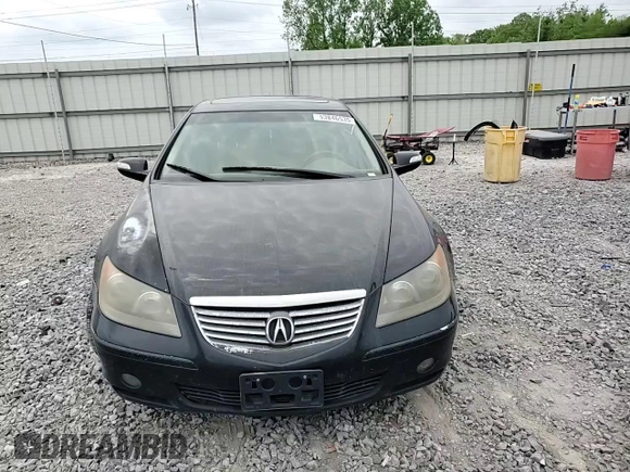 2006 Acura RL z VIN JH4KB16586C010597, wystawiony jako Copart lot #53846535 z przebiegiem 212 219 mil mil oraz Szkoda całkowita • Salvage title. Historia ofert i sprzedaży dostępna na DreamBid. Obrazek 13.