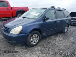 2009 Kia Sedona LX with VIN KNDMB233696278019, listed as a IAAI auction lot 41983960 with 153,083 mi miles. Bid and sale history available at carsss.com. Image 2.