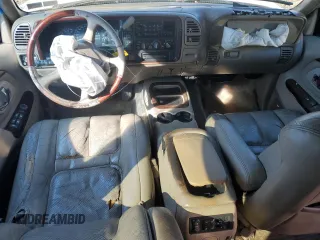 2000 Cadillac Escalade z VIN 1GYEK63R0YR185780, wystawiony jako Copart lot #80620994 z przebiegiem 16 717 mil mil oraz Szkody całkowita. Historia ofert i sprzedaży dostępna na DreamBid. Obrazek 8.