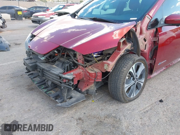 2019 Nissan LEAF SV z VIN 1N4AZ1CP7KC303423, wystawiony jako IAAI lot #42217532 z przebiegiem 67 992 mil mil oraz . Historia ofert i sprzedaży dostępna na DreamBid. Obrazek 6.