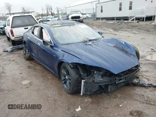 2016 Tesla Model S 90D with VIN 5YJSA1E44GF169960, listed as a IAAI auction lot 41523807 with 124,738 mi miles and . Bid and sale history available at DreamBid. Image 1.