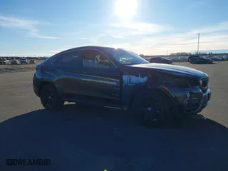 2015 BMW X6 xDrive35i with VIN 5UXKU2C50F0N77926, listed as a IAAI auction lot 41681268 with 136,118 mi miles. Bid and sale history available at carsss.com. Image 13.