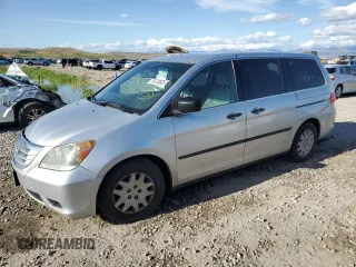 2010 Honda Odyssey LX with VIN 5FNRL3H25AB100488, listed as a Copart auction lot 54738825 with 204,654 mi miles and Salvage title. Bid and sale history available at DreamBid. Image 1.