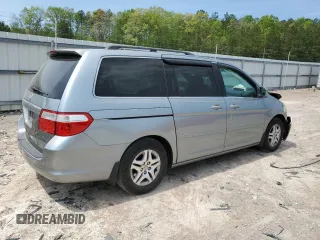 2007 Honda Odyssey EX-L with VIN 5FNRL38657B059033, listed as a Copart auction lot 54005495 with 212,674 mi miles and Salvage Title. Bid and sale history available at DreamBid. Image 3.