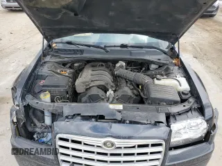2009 Chrysler 300 LX z VIN 2C3KA43D79H556962, wystawiony jako Copart lot #58315205 z przebiegiem 177 577 mil mil oraz Szkoda całkowita • Salvage title. Historia ofert i sprzedaży dostępna na DreamBid. Obrazek 11.