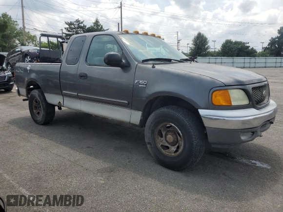 2004 Ford F-150 XL with VIN 2FTRX18W04CA42944, listed as a Copart auction lot 66496505 with 238,990 mi miles and Clean title. Bid and sale history available at DreamBid. Image 4.
