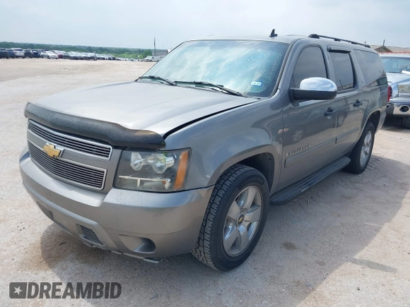 2007 Chevrolet Suburban LS with VIN 1GNFC160X7J233586, listed as a IAAI auction lot 42165186 with 240,183 mi miles and . Bid and sale history available at DreamBid. Image 2.