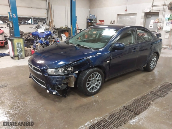 2013 Mitsubishi Lancer SE with VIN JA32V2FW9DU005616, listed as a IAAI auction lot 41247087 with 129,055 mi miles. Bid and sale history available at carsss.com. Image 2.